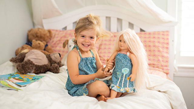 little girl and doll matching clothes