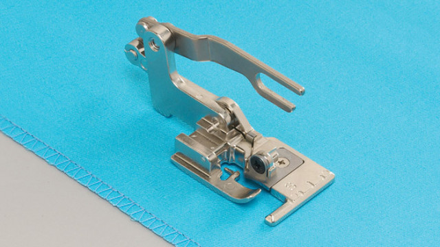 Side cutter II sewing machine foot attachment. 